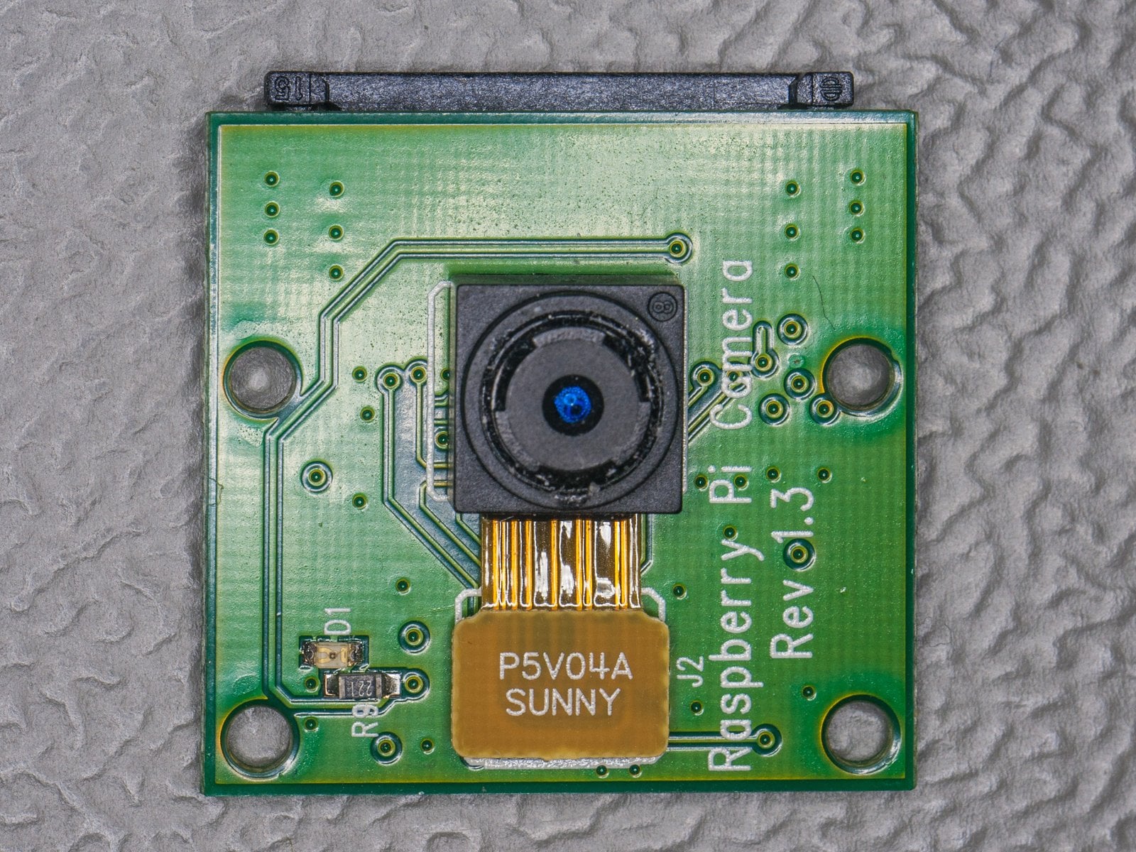 Raspberry Pi Camera Module v1 from 2013 with ribbon cable